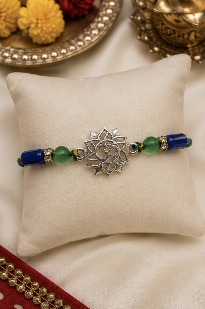 Handcrafted Silver Om Lotus Rakhi